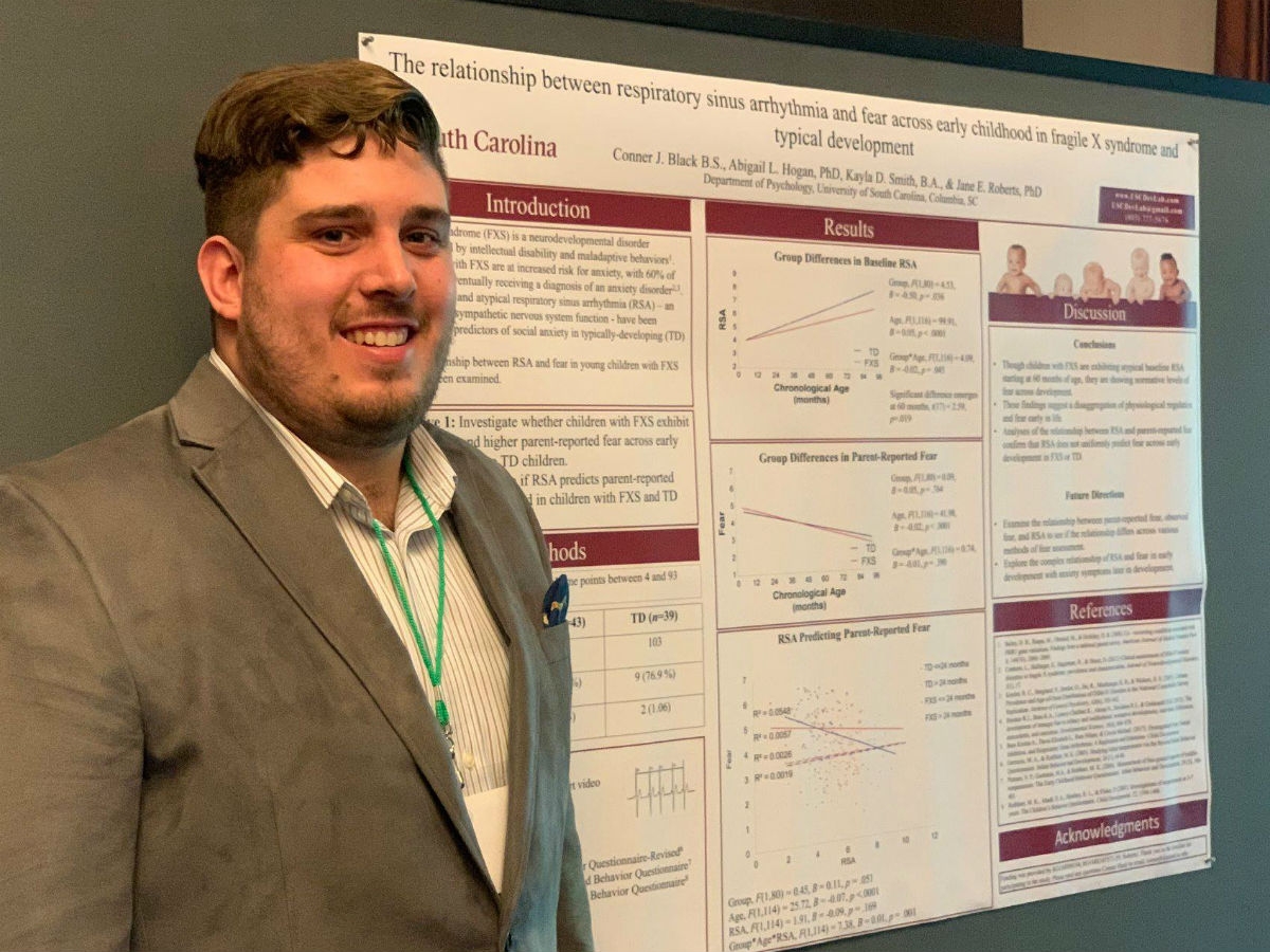 Conner Black presenting a poster at the 2019 Gatlinburg Conference